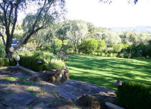 Beautifully manicured lawns and gorgeous stone by Hurtado's Landscaping